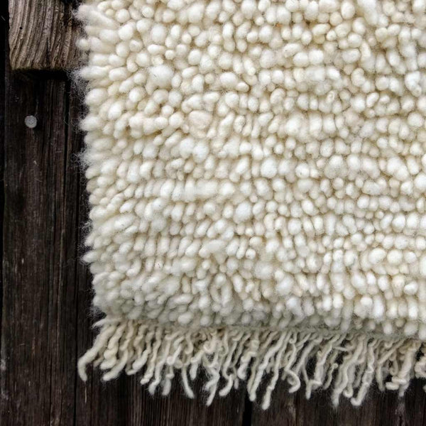 hand woven white rug