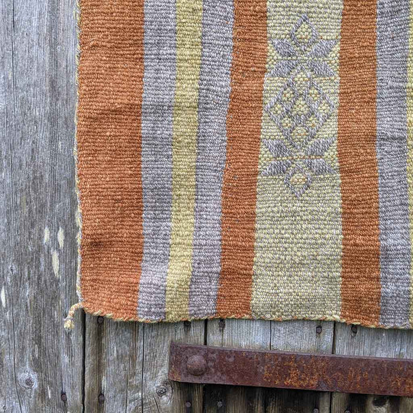 natural dye rug flower pattern