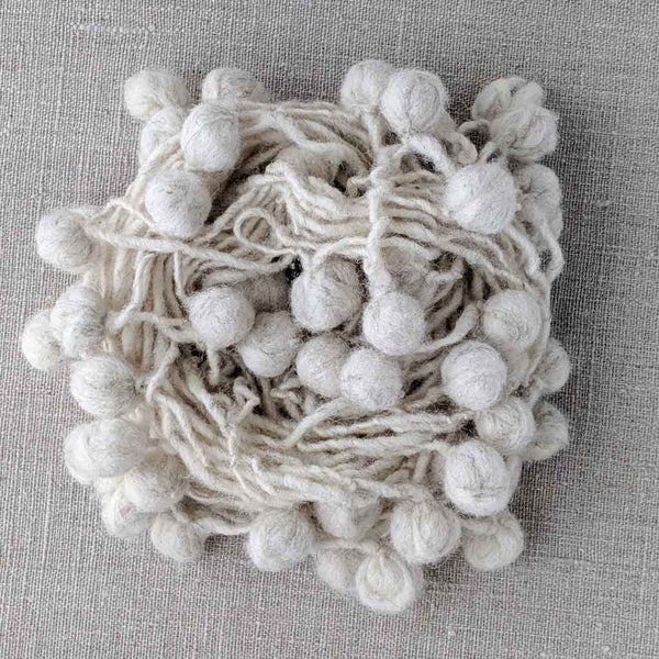 white pompoms for craft