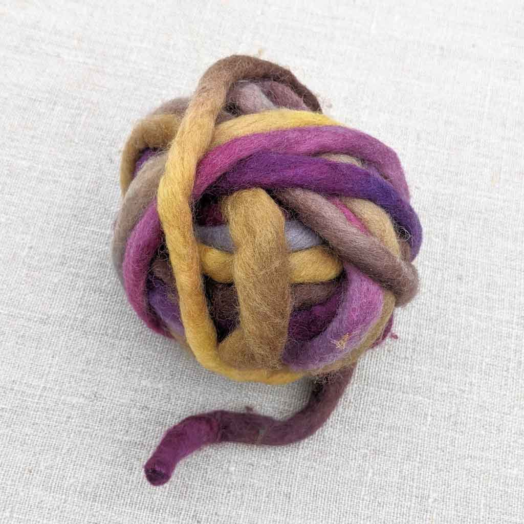 wool art yarn purple yellow