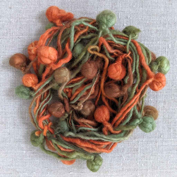 wool pom poms for crafting