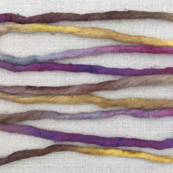 wool yarn for wallhangings purple yellow